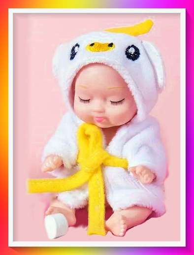 Adorable doll with cute duck design pajama outfit and surprise gift
