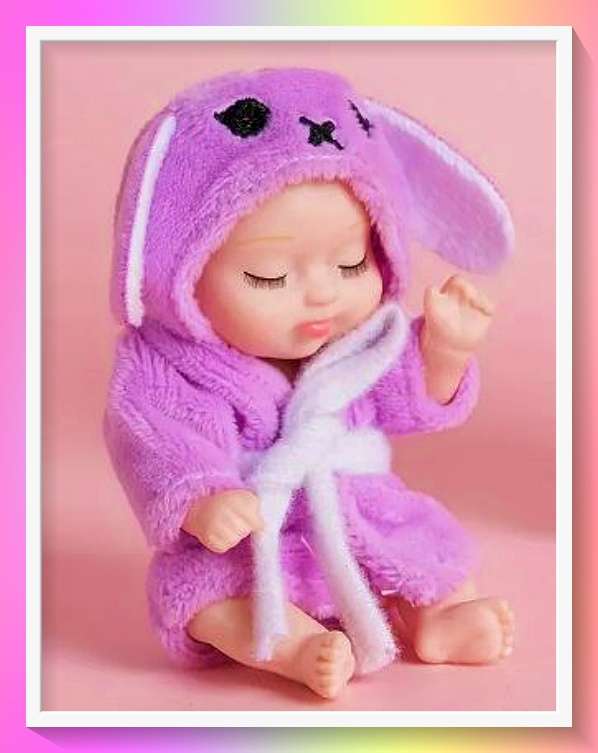 Enchanting sleepy doll with cute purple bunny design pajama outfit and surprise gift