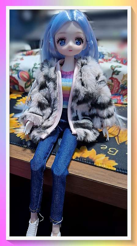 Beautiful 30cm jointed doll with full outfit and surprise gift