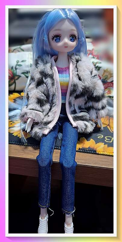 Beautiful 30cm jointed doll with full outfit and surprise gift