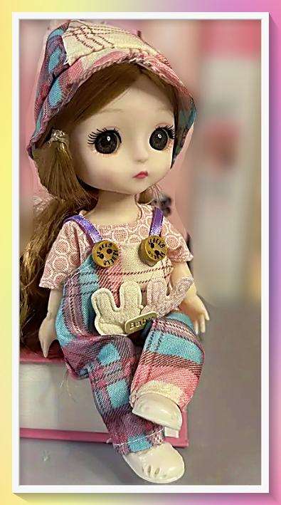 Charming pink fashionable multiple jointed doll with full outfit