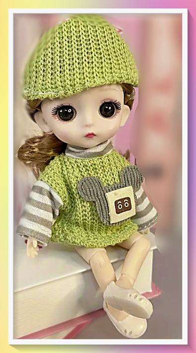 Adorable fashionable multiple jointed doll with full outfit