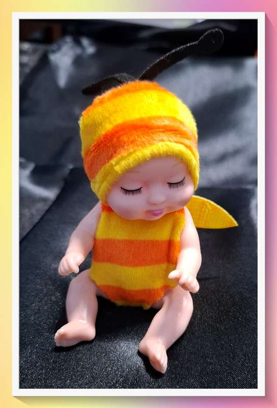 Sweet stripy honey bee sleeping baby doll