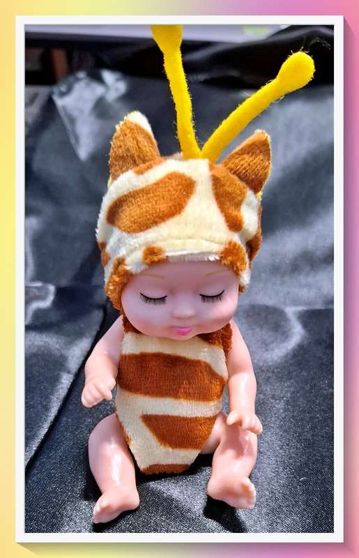 Adorable Mini giraffe sleeping baby doll