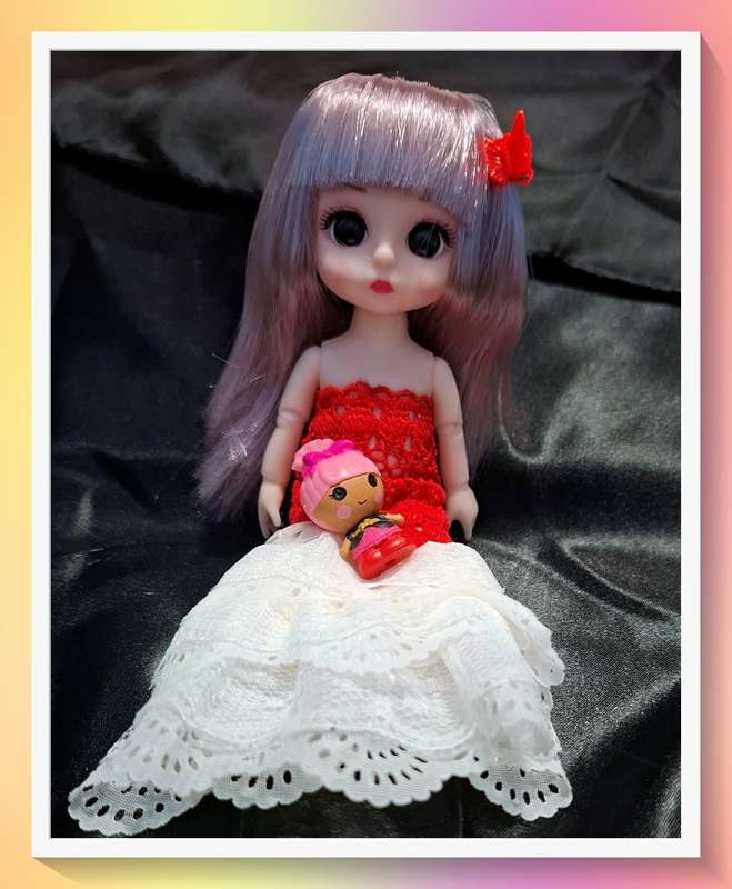Sweet little doll with custom made lacy dress and free gift