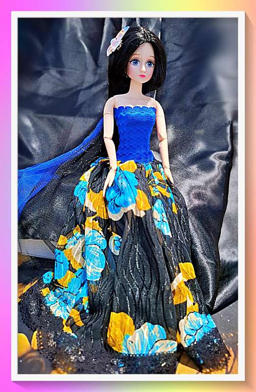 Stunning Spanish style jointed doll with free gift