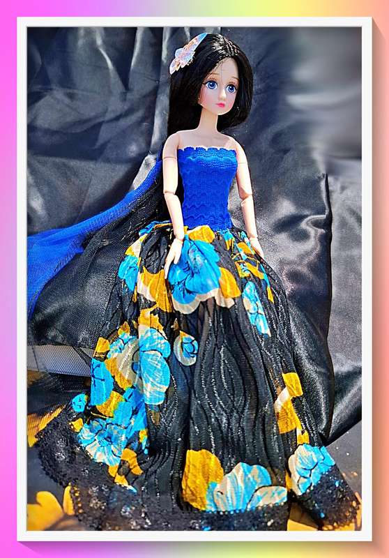 Stunning Spanish style jointed doll with free gift