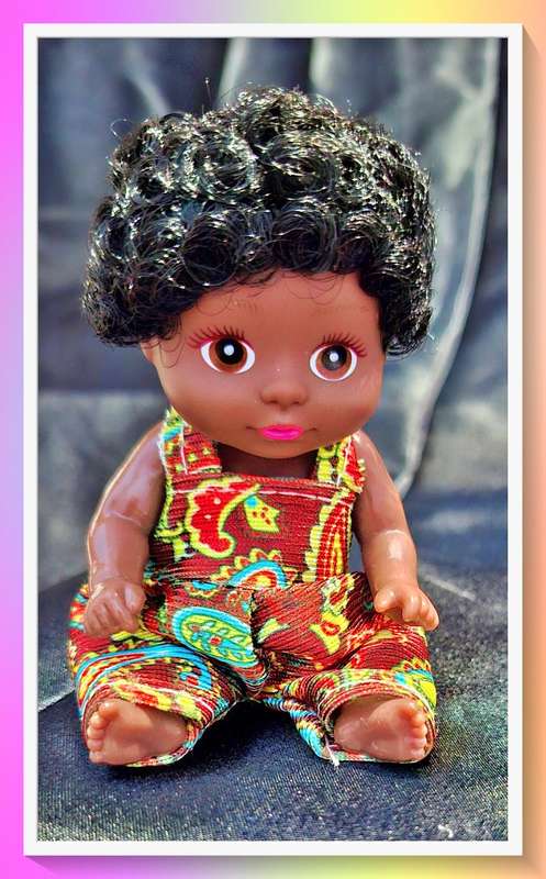 Super cute pocket size curly hair doll