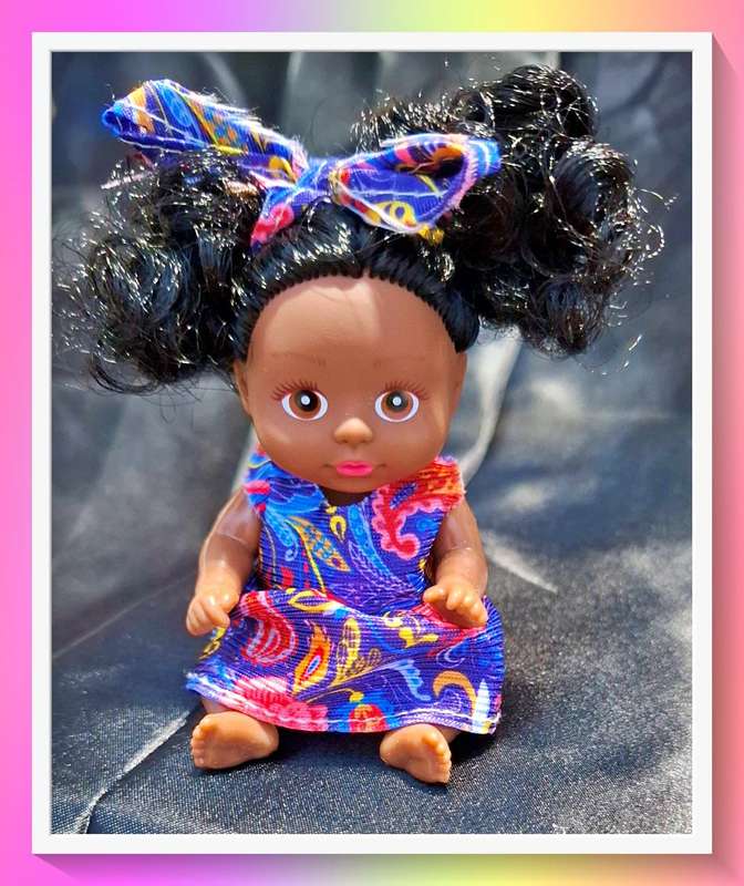 Super sweet pocket size curly hair doll
