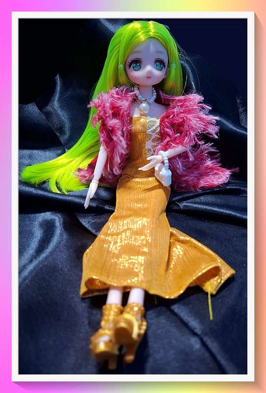 Gorgeous golden and raspberry outfit doll