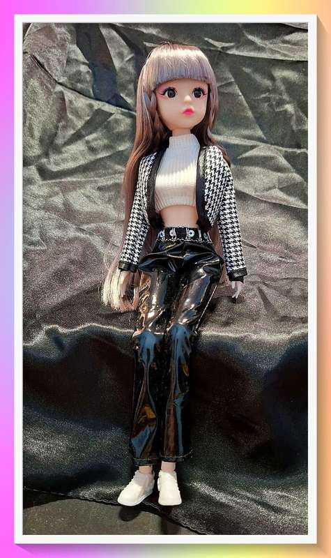 Stunning party doll with mock leather pants and bonus item
