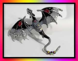 Delightful silver and red flying dragon brooch