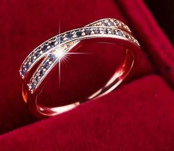 Stunning crossover ring with sparkling crystal insets size: 10