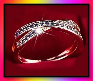 Stunning crossover ring with sparkling crystal insets size: 22mm ID