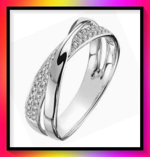 Lovely silvertone crossover ring with clear crystals size 9