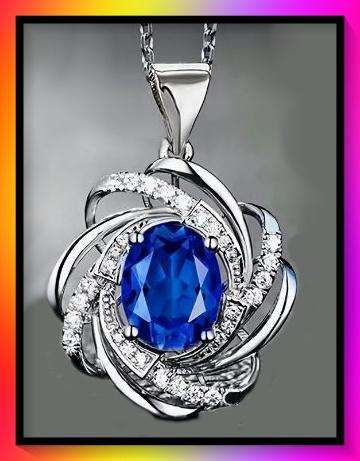 Trancending spiral design pendant with blue crystal stone on silvertone necklace