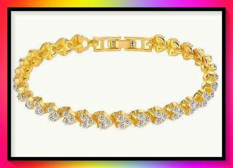 Beautiful Heart design gold colour simulated topaz tennis bracelet
