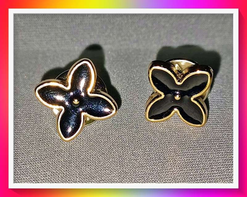 Lovely black flower starburst lapel pin set