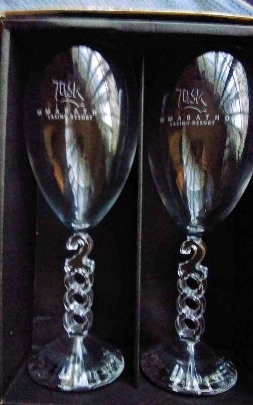 Millennium 2 Tusk promotional glasses