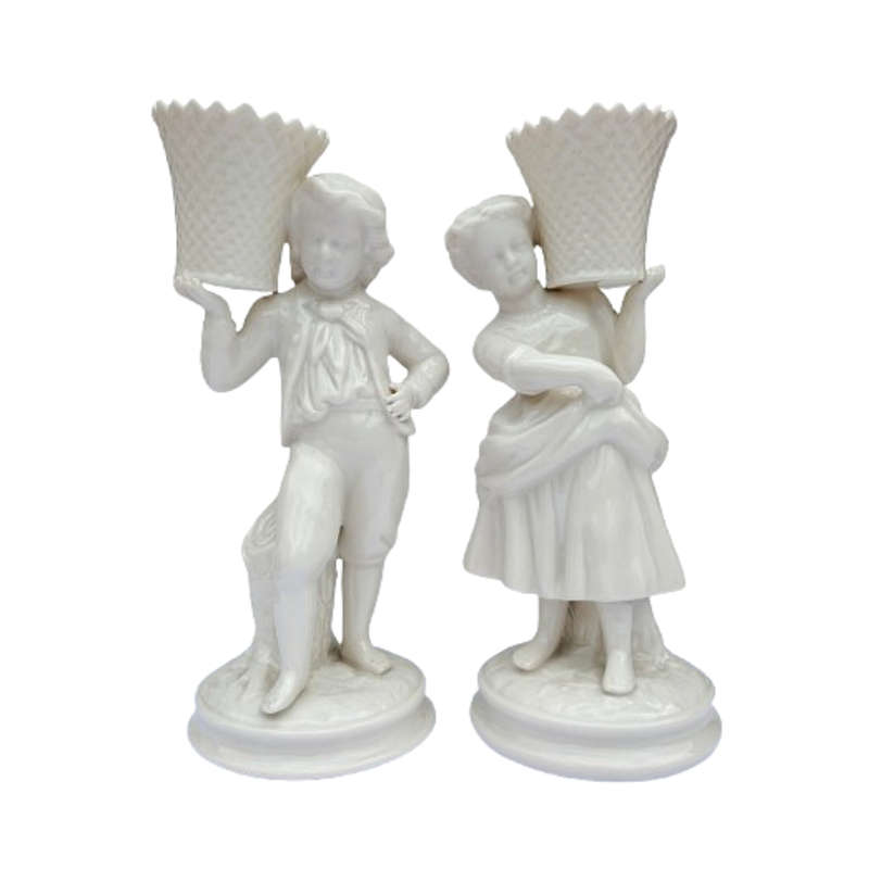 Belleek classic Boy and Girl basket carrier figurines part of the Archive Collection