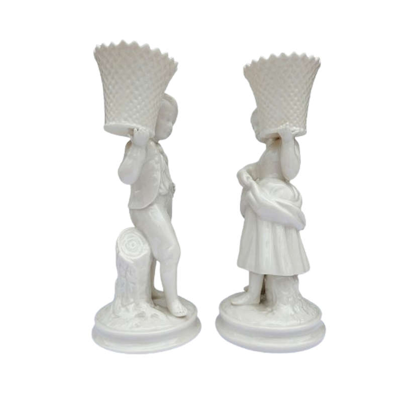 Belleek classic Boy and Girl basket carrier figurines part of the Archive Collection