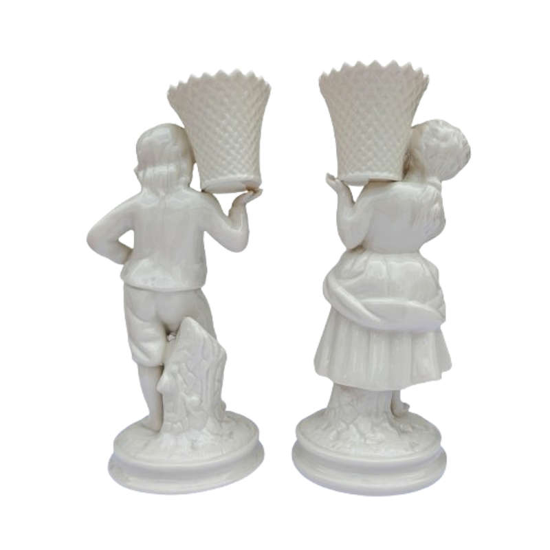 Belleek classic Boy and Girl basket carrier figurines part of the Archive Collection