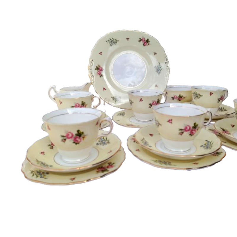 Colclough Tea Set Pale Yellow Bands decorated with colorful flowers