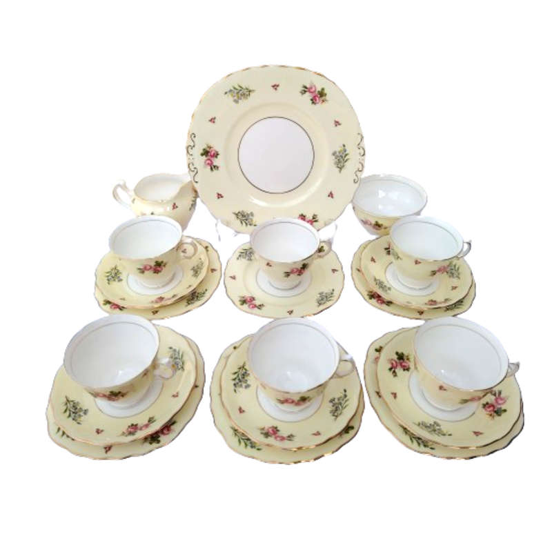 Colclough Tea Set Pale Yellow Bands decorated with colorful flowers
