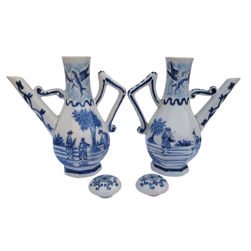 Blue and white faience wares pair of condiment ewers and twin-bowl