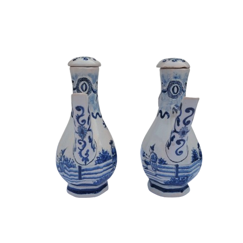 Blue and white faience wares pair of condiment ewers and twin-bowl