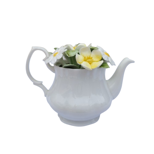 Royal Doulton bone china teapot pot with a flower arrangement on top