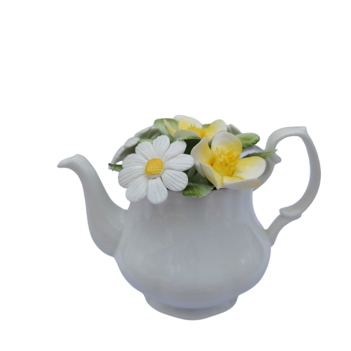 Royal Doulton bone china teapot pot with a flower arrangement on top