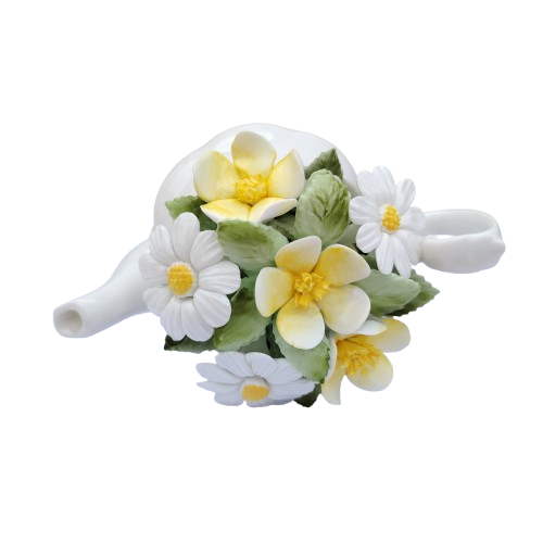 Royal Doulton bone china teapot pot with a flower arrangement on top