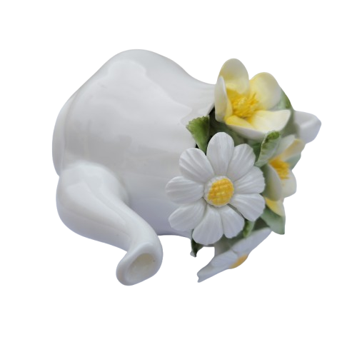 Royal Doulton bone china teapot pot with a flower arrangement on top