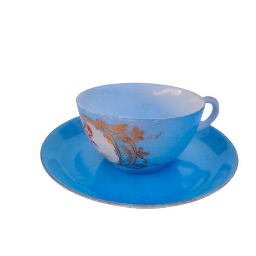 Lovely antique azure blue cherub cup and saucer in Sevres style.