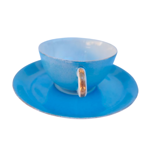 Lovely antique azure blue cherub cup and saucer in Sevres style.
