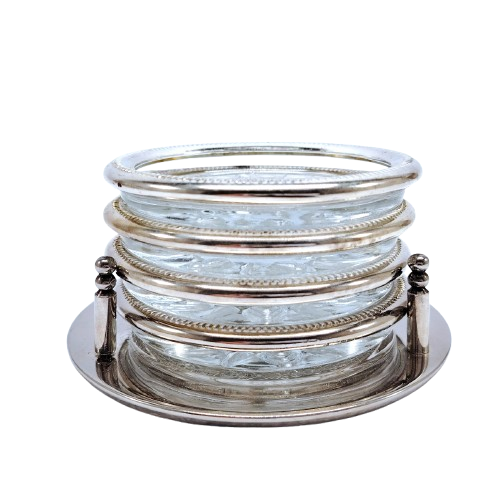 Set of four cut glass and silver coasters in stand