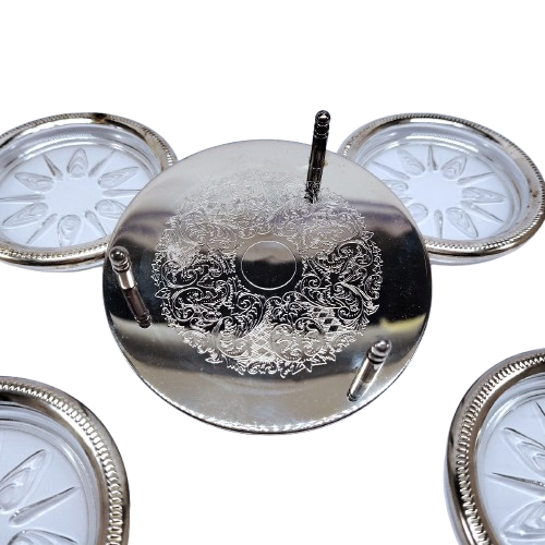 Set of four cut glass and silver coasters in stand