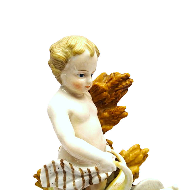Capodimonte style naked cherub Putti porcelain figurine