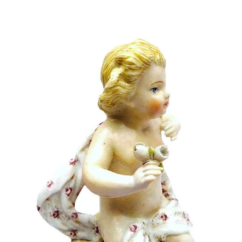 Capodimonte style naked cherub Putti porcelain figurine