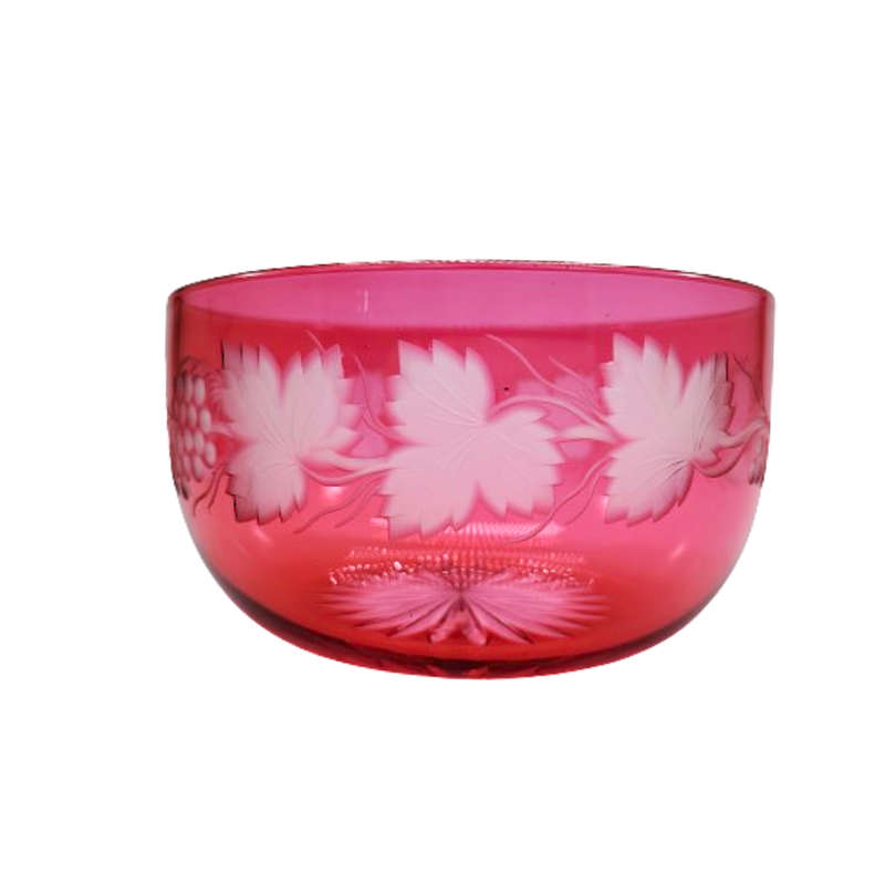 Beautiful engraved cranberry glass bowl decorated with fruiting vine