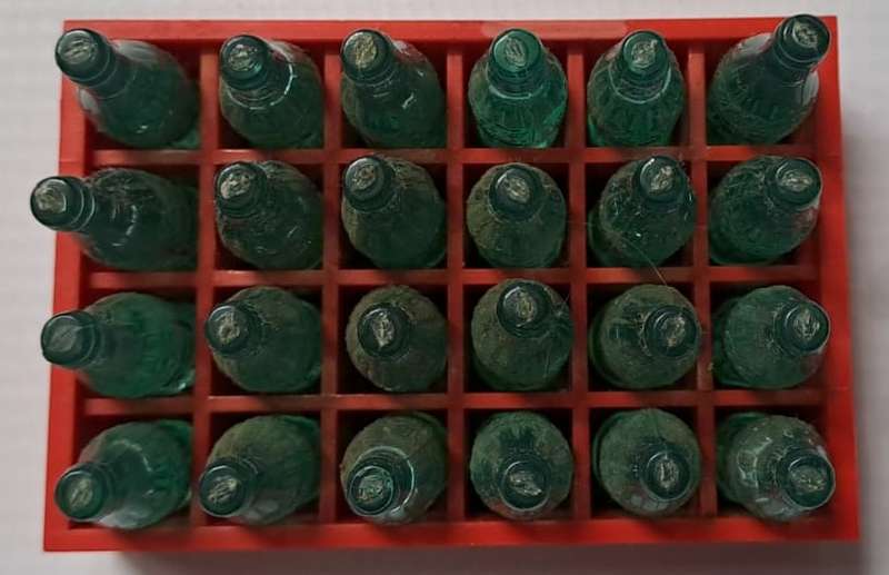 Coke - Coca Cola Miniature Coca-Cola bottles in red tray - Complete.