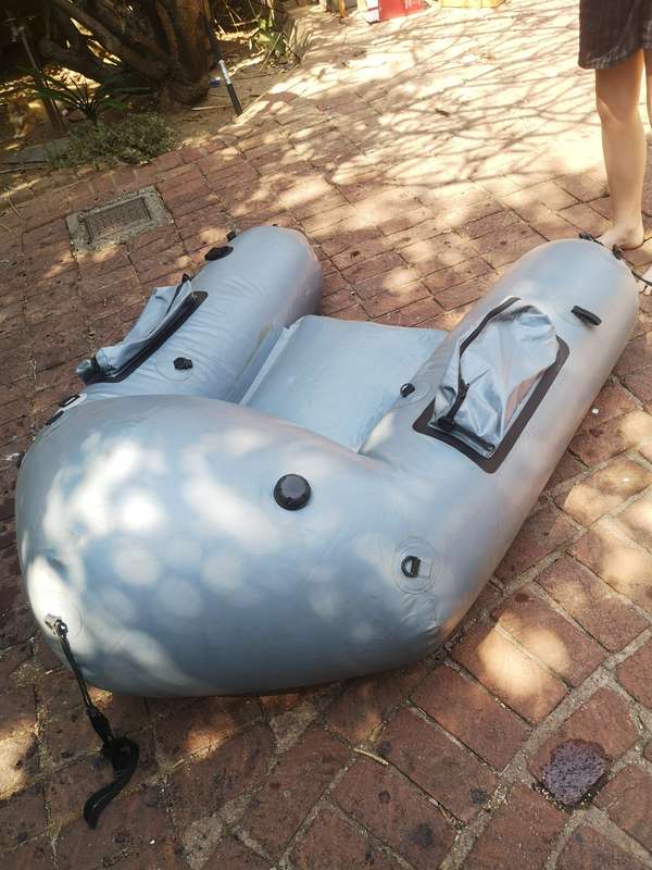 HEAVY DUTY INFLATABLE BASS FISHING BOAT WITH BAG (RUBBER DUCK) STILL NEW NEVER USED