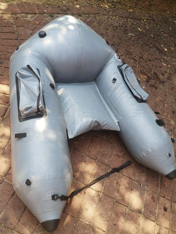 HEAVY DUTY INFLATABLE BASS FISHING BOAT WITH BAG (RUBBER DUCK) STILL NEW NEVER USED