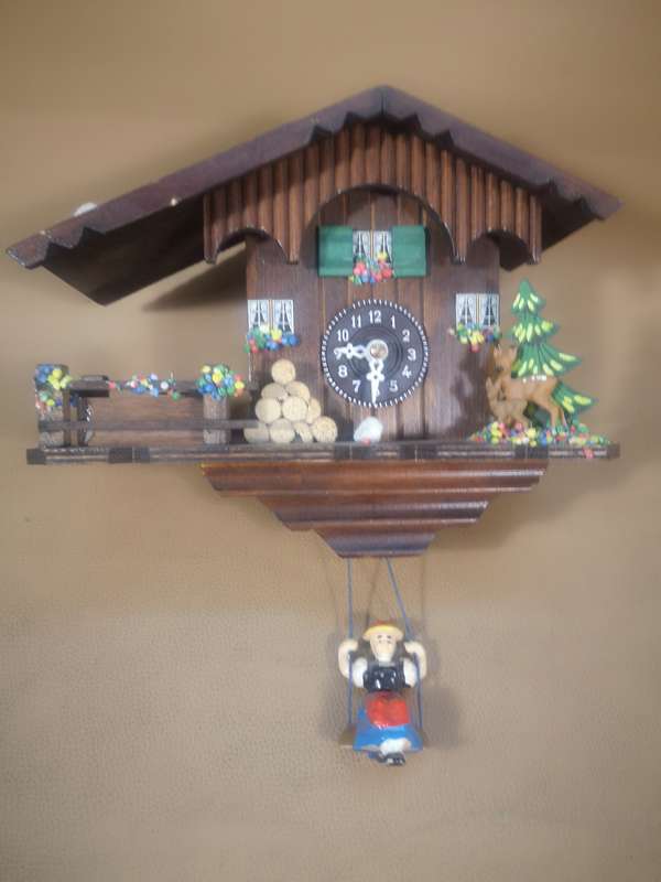 Vintage Black Forest Quartz Swinging Doll Cuckoo Clock by Trenkle Uhren