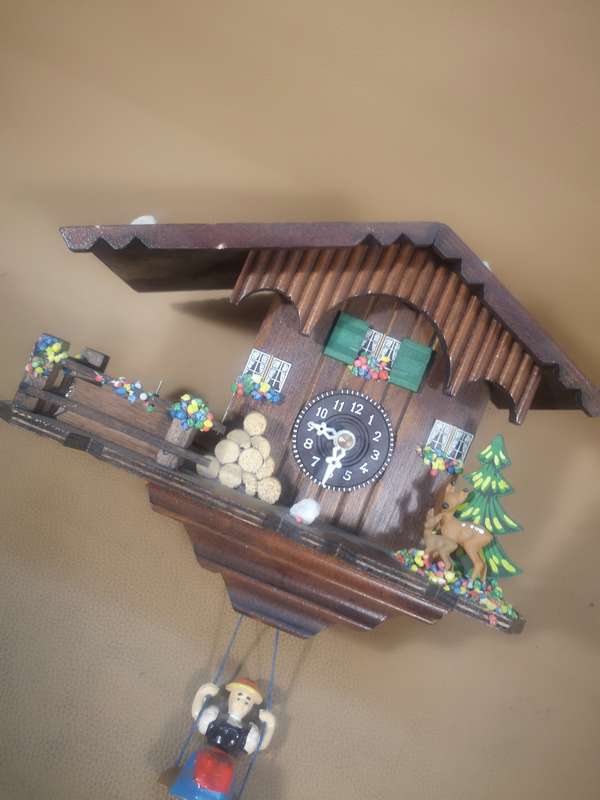 Vintage Black Forest Quartz Swinging Doll Cuckoo Clock by Trenkle Uhren