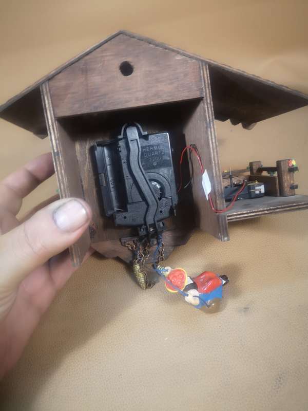 Vintage Black Forest Quartz Swinging Doll Cuckoo Clock by Trenkle Uhren