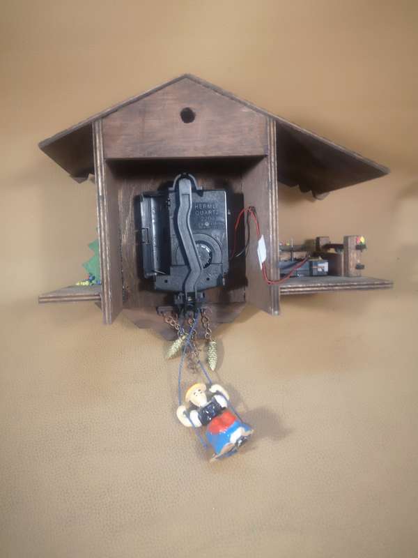 Vintage Black Forest Quartz Swinging Doll Cuckoo Clock by Trenkle Uhren