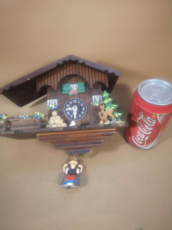 Vintage Black Forest Quartz Swinging Doll Cuckoo Clock by Trenkle Uhren