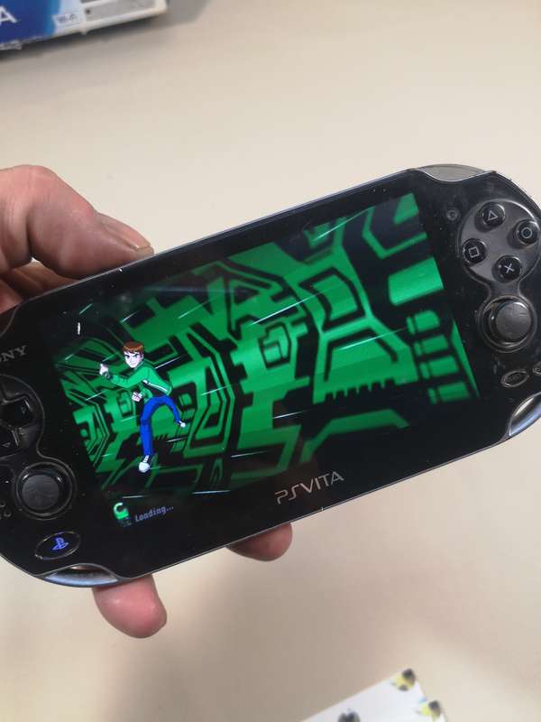 Complete PS Vita With Charge Cable, Booklets, Game and Original Box
